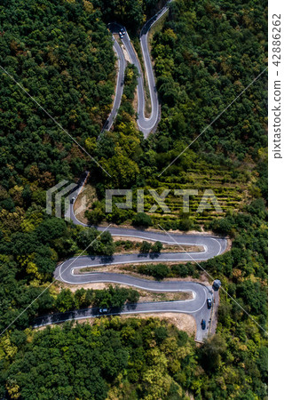 Winding road serpentine from a high mountain pass in the mosel village Brodenbach Germany Aerial Winding road serpentine from a high mountain pass in the mosel village Brodenbach Germany Aerial 42886262