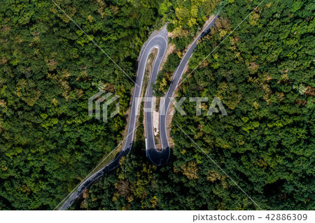 Winding road serpentine from a high mountain pass in the mosel village Brodenbach Germany Aerial 42886309