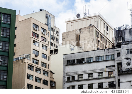 Low angle view old residential concrete buildings Low angle view old residential concrete buildings 42888594