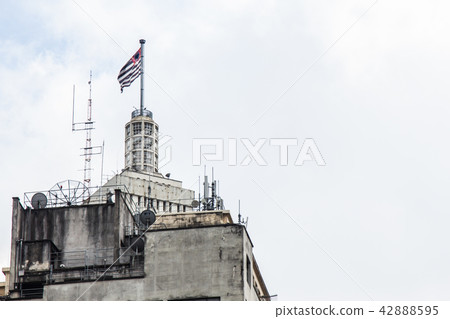 San Paolo State flag on top of a building San Paolo State flag on top of a building 42888595