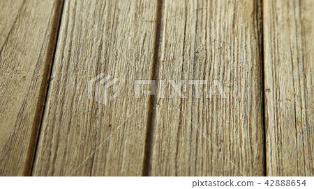 Closeup on wooden board background Closeup on wooden board background 42888654