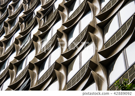 Office building with concrete square windows Office building with concrete square windows 42889092