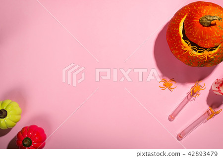 carving pumpkin at home on orange background,  42893479