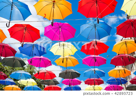 Colorful umbrellas background. Colorful umbrellas Colorful umbrellas background. Colorful umbrellas 42893723