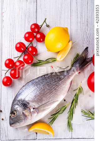 Fresh uncooked dorado or sea bream fish Fresh uncooked dorado or sea bream fish 42893853