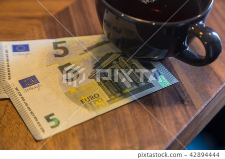 Euro banknotes, bill checking or Money tips. 42894444