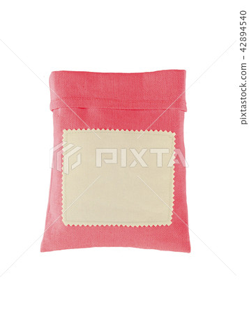 Pouch, pack of coarse fabric, with a blank label. Bag from a sacking isolated Pouch, pack of coarse fabric, with a blank label. Bag from a sacking isolated 42894540
