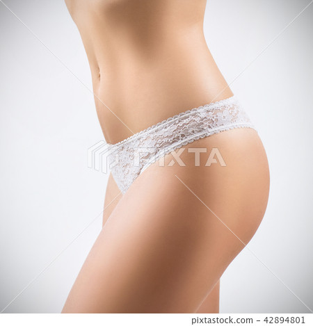 Rear view on woman's slim body in lace lingerie. Rear view on woman's slim body in lace lingerie. 42894801