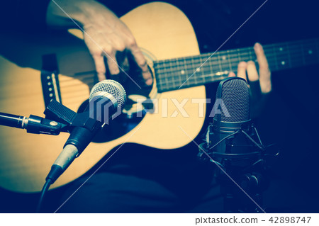 microphone recording acoustic guitar sound microphone recording acoustic guitar sound 42898747