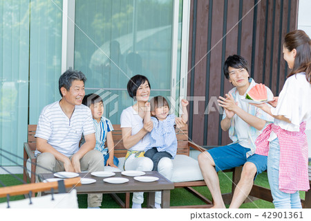 Three generations family, meal, watermelon, summer Three generations family, meal, watermelon, summer 42901361