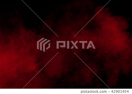 abstract red dust splattered on black background. abstract red dust splattered on black background. 42901954