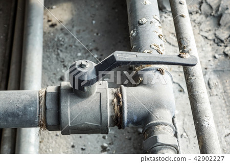 pipe off the water supply, both old rust corrosion pipe off the water supply, both old rust corrosion 42902227