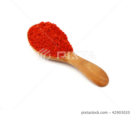 Wooden scoop spoon full of red hot chili pepper 42903020