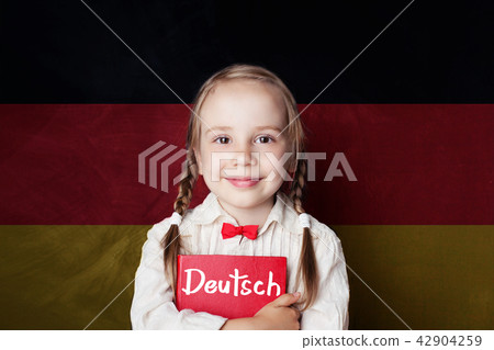 Learning german language concept with happy child 42904259