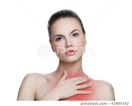 Young woman having a pain in a chest neck area Young woman having a pain in a chest neck area 42905542