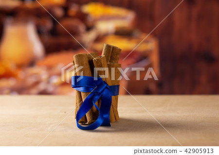 Dry brown cinnamon stick with rustic kitchen Dry brown cinnamon stick with rustic kitchen 42905913