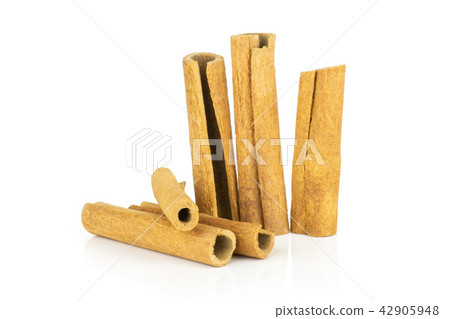 Dry brown cinnamon stick isolated on white 42905948