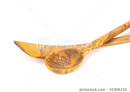 Kitchen tool isolated on brown wood 42906256