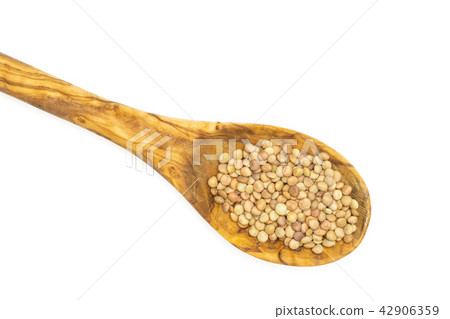 Raw green lentil seeds isolated on white 42906359