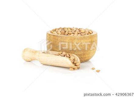 Raw green lentil seeds isolated on white Raw green lentil seeds isolated on white 42906367