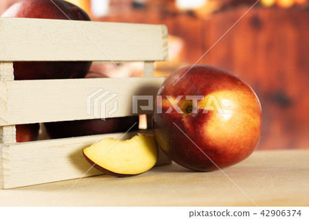 Ripe deep red nectarine 42906374