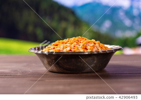 Raw red lentils with country nature 42906493