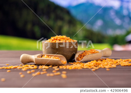 Raw red lentils with country nature 42906496