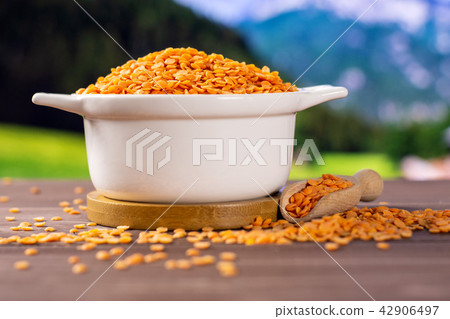 Raw red lentils with country nature 42906497
