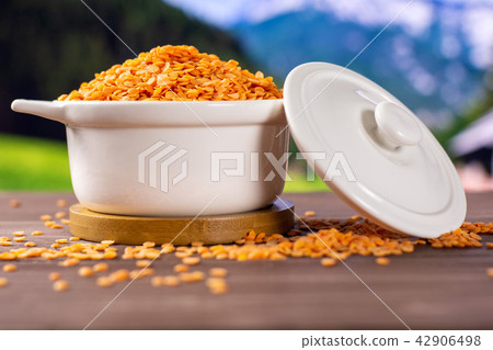 Raw red lentils with country nature 42906498