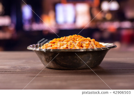 Raw red lentils with restaurant 42906503