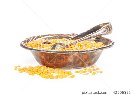 Raw red lentils isolated on white Raw red lentils isolated on white 42906555