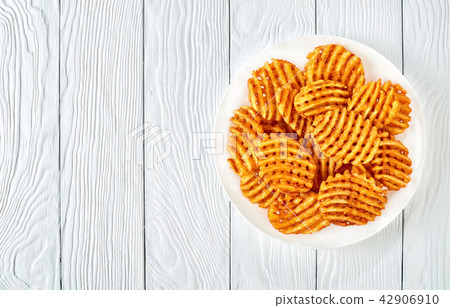 Crispy Potato Waffles Fries, flat lay Crispy Potato Waffles Fries, flat lay 42906910