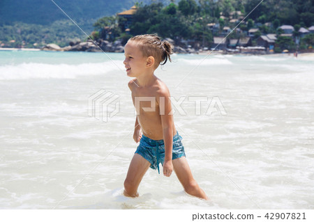 little boy in the sea in Thailand little boy in the sea in Thailand 42907821