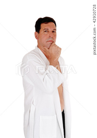 A business man sitting jacked over shoulder 42910728