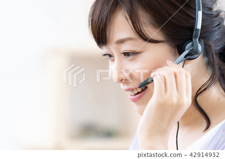 Women middleweight learning foreign languages chatting with headset 42914932