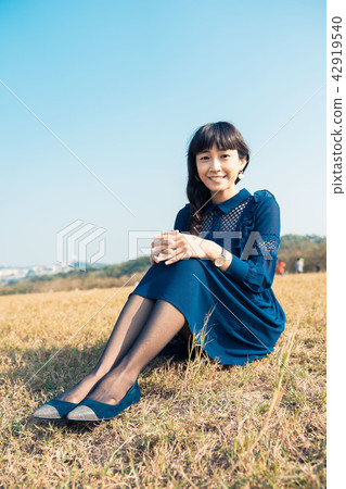 Asian Taiwan Hsinchu Qingqing grassland female portrait portrait dress grassland character model one person 42919540