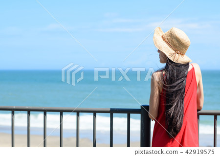Summer women's travel beach resort young Japanese lady 42919575