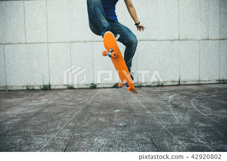 one skateboarder skateboarding on city one skateboarder skateboarding on city 42920802