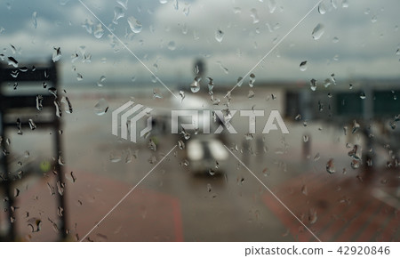 Blured image of airplane at the terminal gate ready for takeoff - Modern international airport on 42920846