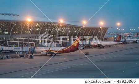 15 July, 2018. Pudong Airport, Shanghai, China. Modern passenger airplanes parked to terminal 42920860
