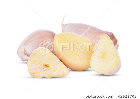 Garlic cloves on white background Garlic cloves on white background 42922702
