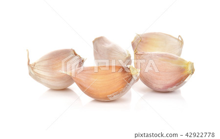 Garlic cloves on white background 42922778
