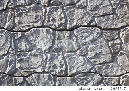 Fence of ornamental stone, ray background stylized 42925247