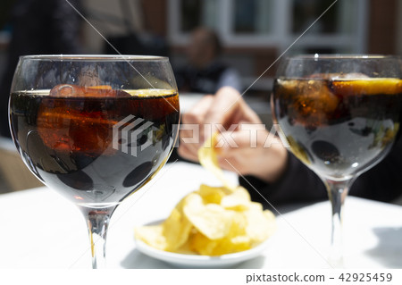 vermouth and chips, typical appetizer in Catalonia 42925459