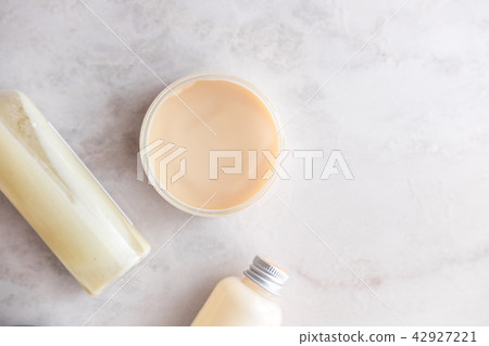 Spa beauty cosmetics on white marble Spa beauty cosmetics on white marble 42927221