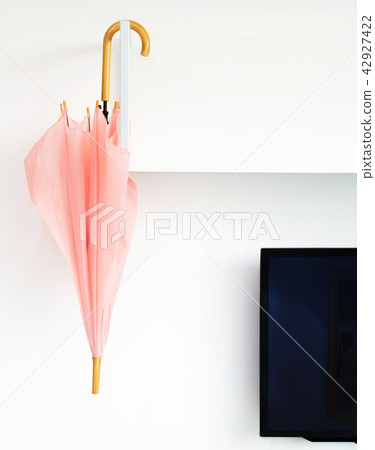 umbrella keep on shelf and white wall umbrella keep on shelf and white wall 42927422