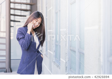 Business woman talking to customer for background. 42928894