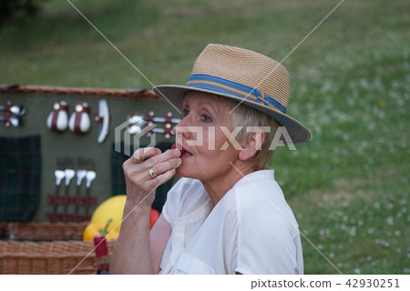 raspberries for a picnic refresh this young woman 42930251