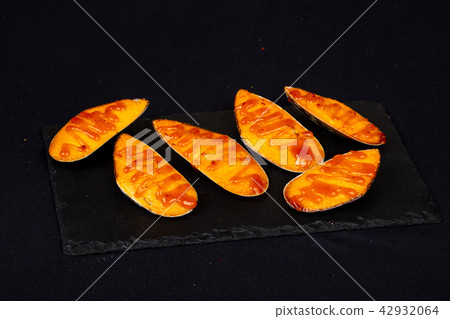 Baked mussels with cheese Baked mussels with cheese 42932064