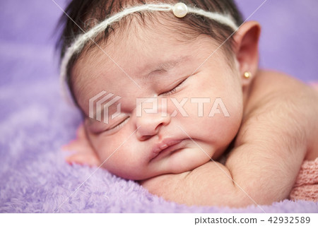 Macro close-up newborn portrait Macro close-up newborn portrait 42932589